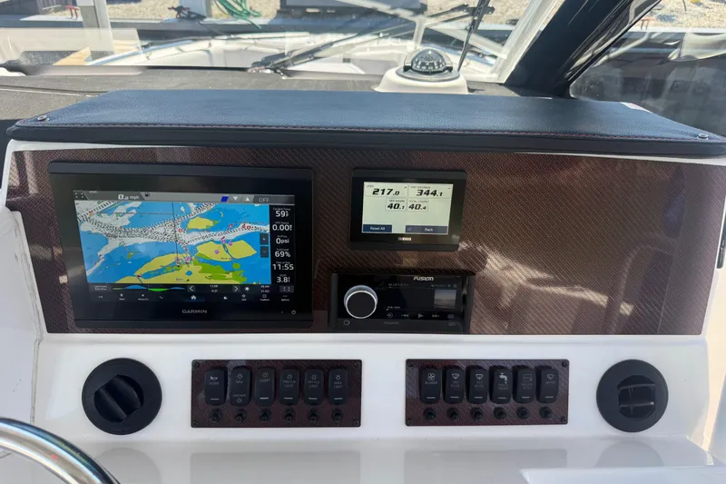 Slide: The Image of Dashboard of 2024 Solara S-250 CW boat with navigation and control systems. - 20
