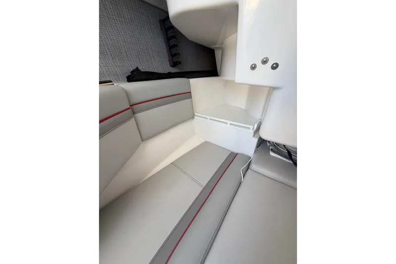 Slide: The Image of 2024 Solara S-250 CW interior with sleek gray seating and red accents. - 30