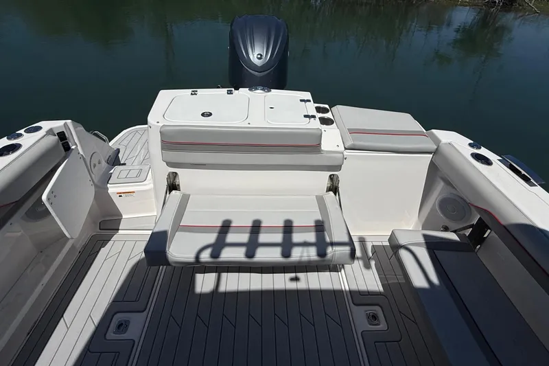 Slide: The Image of 2024 Solara S-250 CW boat interior with seating and storage compartments. - 8