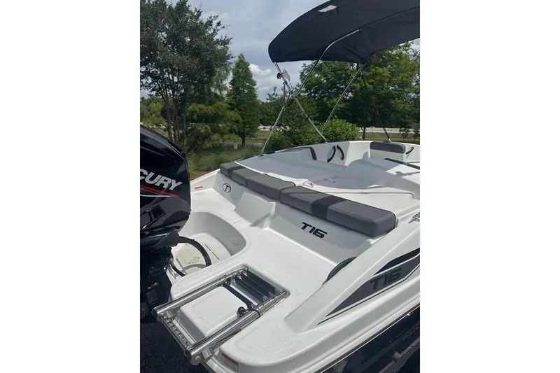 Slide: The Image of 2026 Tahoe T16 boat with Mercury engine, featuring sleek design and comfortable seating. - 2