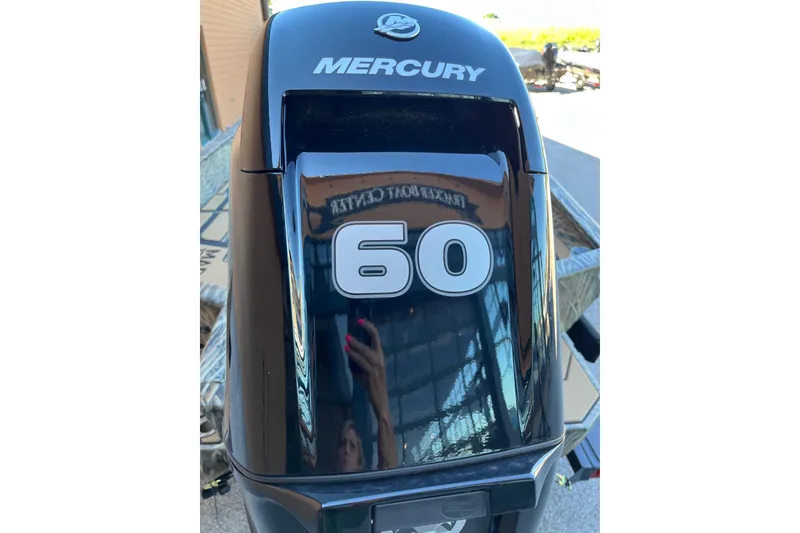 Slide: The Image of Mercury 60 horsepower engine on 2026 Tracker Grizzly 1756 T Marsh boat. - 7