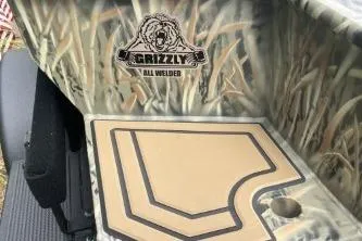 Slide: The Image of 2026 Tracker Grizzly 1650 T Prairie Wings Edition with camo interior design. - 5