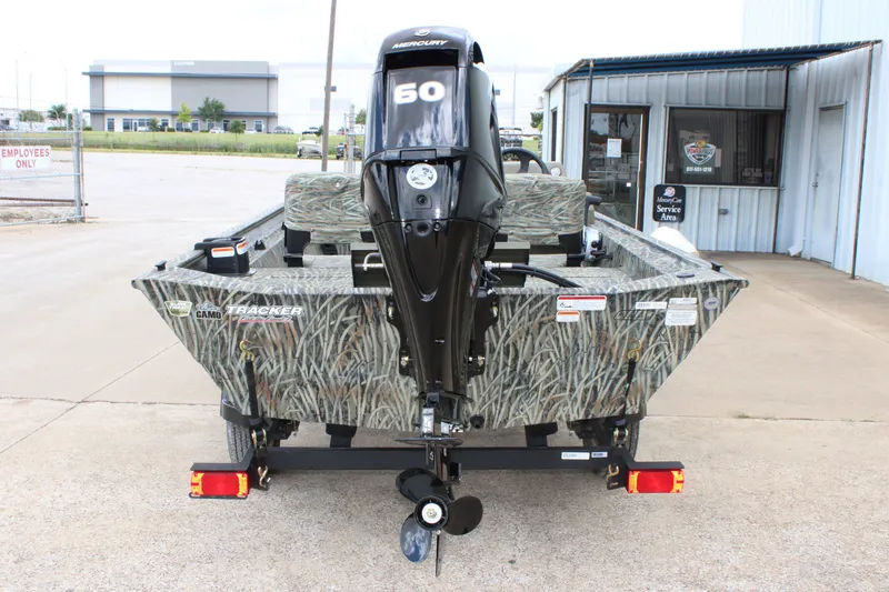 Slide: The Image of 2026 Tracker Grizzly 1754 SC boat with camouflage design and Mercury 60 engine. - 9
