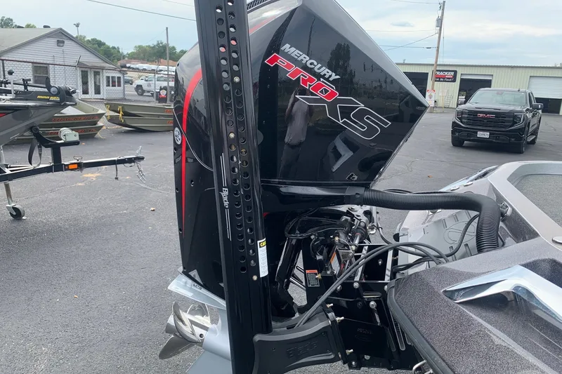 Slide: The Image of 2026 Ranger Z520R Cup-Equipped boat with Mercury Pro XS engine in a dealership lot. - 1