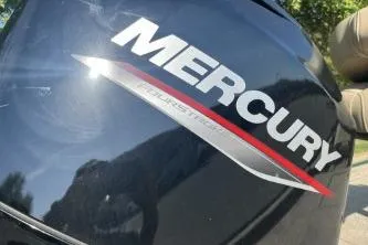 Slide: The Image of Close-up of Mercury outboard motor on 2026 Tracker Bass Tracker Classic Limited boat. - 6