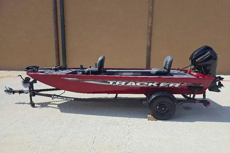 The Image of 2026 Tracker Panfish 17 boat with Mercury engine on trailer, side view. - 0