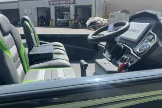 Slide: The Image of 2026 Ranger RT188P boat interior with modern steering and seating. - 7