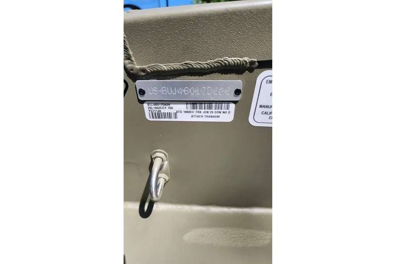 Slide: The Image of 2026 Tracker Grizzly 1860 CC boat identification plate with serial number and details. - 6