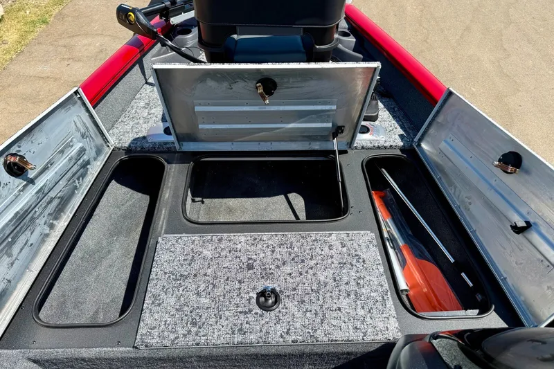 Slide: The Image of 2026 Tracker Pro Team 175 Crappie Edition boat storage compartments open, showcasing interior layout. - 14