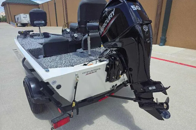 Slide: The Image of 2026 Tracker Pro 170 boat with Mercury 50 outboard motor on trailer. - 5