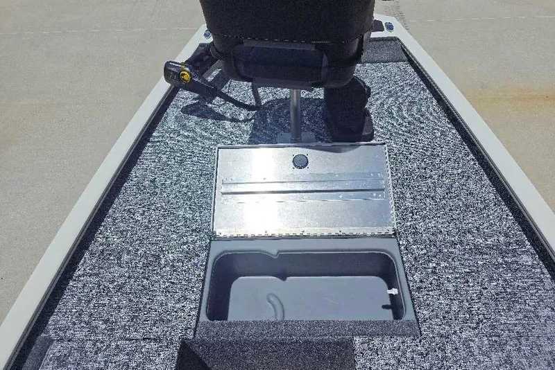 Slide: The Image of 2026 Tracker Pro 170 boat interior with storage compartment and seat. - 9