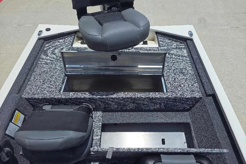 Slide: The Image of 2026 Tracker Pro 170 boat interior with seating and storage compartments. - 8