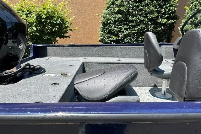 Slide: The Image of 2026 Tracker Pro Guide V-175 WT boat interior with seating and storage compartments. - 8