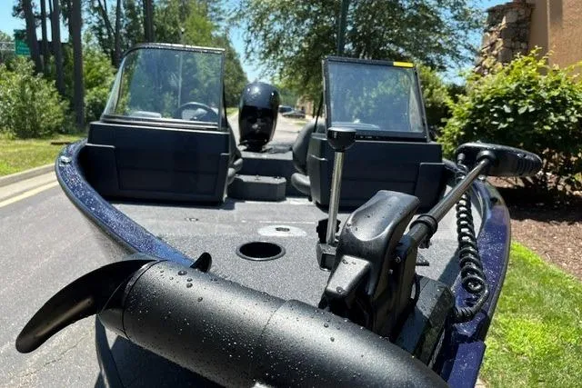 Slide: The Image of 2026 Tracker Pro Guide V-175 WT boat with dual windshields on a sunny day. - 69