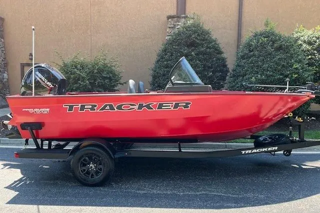 The Image of 2026 Tracker Pro Guide V-175 Combo boat in vibrant red on a trailer. - 0