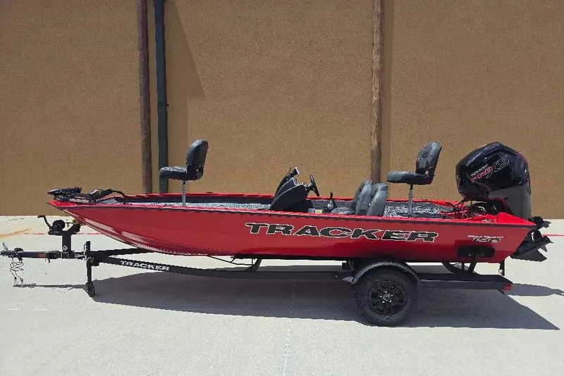 Slide: The Image of 2026 Tracker Pro Team 190 boat in red, on a trailer, side view. - 4