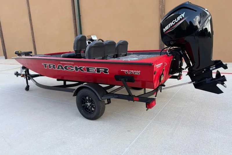 Slide: The Image of 2026 Tracker Pro Team 175 Crappie Edition boat with Mercury engine on trailer. - 5