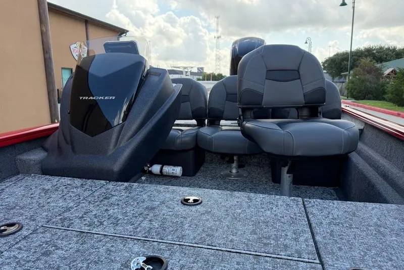 Slide: The Image of 2026 Tracker Pro Team 175 Crappie Edition boat interior with seating and console. - 14