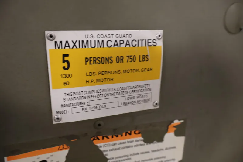 Slide: The Image of 2014 Lowe Roughneck 1756 capacity label, 5 persons or 750 lbs, 60 HP motor. - 21