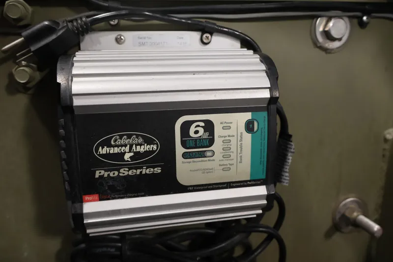 Slide: The Image of Cabela's Advanced Anglers ProSeries charger in a 2014 Lowe Roughneck 1756 boat. - 24