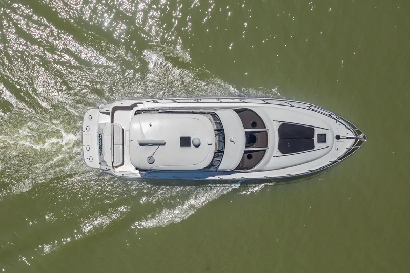 Slide: The Image of Aerial view of a 2003 Sea Ray 480 Sedan Bridge on water. - 20