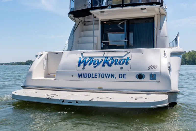 Slide: The Image of Rear view of 2003 Sea Ray 480 Sedan Bridge yacht. - 31