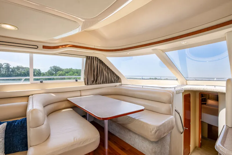 Slide: The Image of Interior of 2003 Sea Ray 480 Sedan Bridge with panoramic windows. - 39