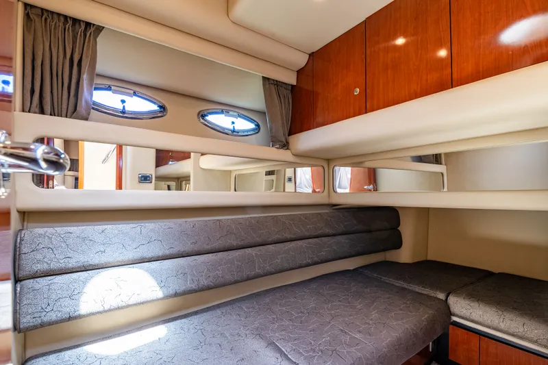 Slide: The Image of Interior of 2003 Sea Ray 480 Sedan Bridge with comfortable sleeping area. - 46