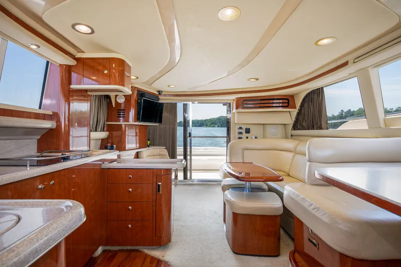 Slide: The Image of Interior of 2003 Sea Ray 480 Sedan Bridge with luxurious design. - 47