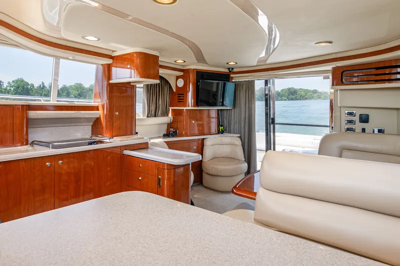 Slide: The Image of Luxurious interior of 2003 Sea Ray 480 Sedan Bridge yacht. - 48