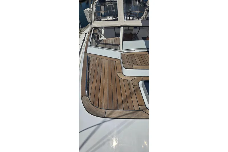 Slide: The Image of 1995 Contest 46/48 yacht deck with teak wood finish. - 18