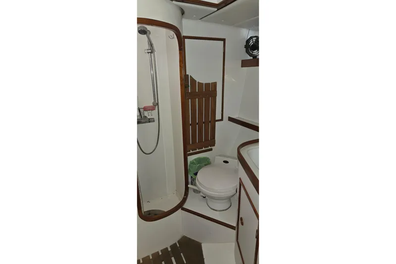 Slide: The Image of Bathroom interior of 1996 Contest 46/48 yacht with shower and toilet. - 13