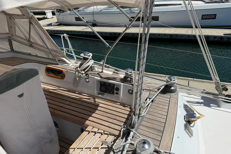 Slide: The Image of Sailboat cockpit with wooden deck, ropes, and winches, Contest 46/48, 1996 model. - 17