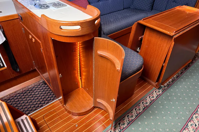 Slide: The Image of Interior of a 1996 Contest 46/48 yacht with wooden cabinetry and seating. - 19