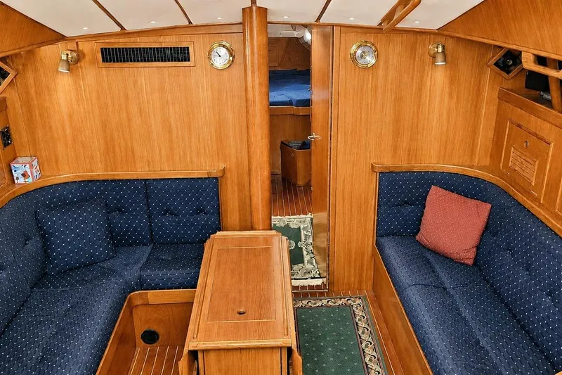 Slide: The Image of Luxurious 1996 Contest 46/48 yacht interior with elegant wood finish and plush seating. - 30