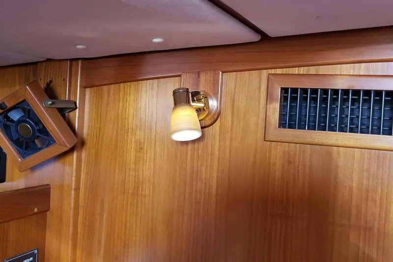 Slide: The Image of Wooden interior of a 1996 Contest 46/48 yacht with light fixture and ventilation. - 33