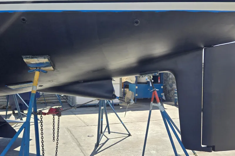 Slide: The Image of Bottom view of a 1996 Contest 46/48 yacht on stands in a boatyard. - 4