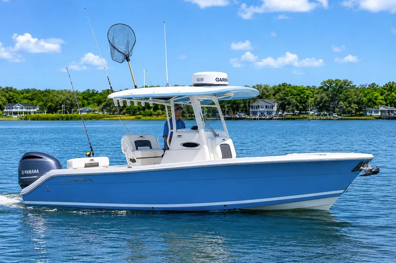 The Image of Cobia 240 Center Console boat on calm water, 2020 model. - 0