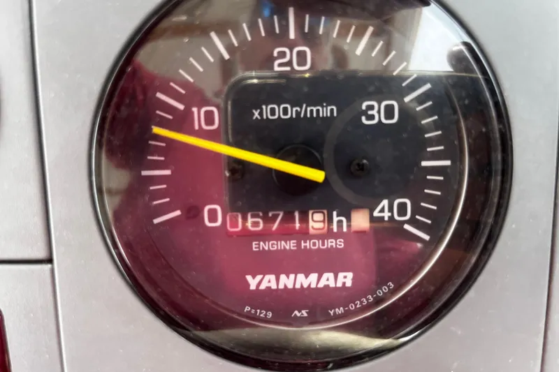 Slide: The Image of Close-up of Yanmar engine hour meter showing 6719 hours on Lyman-Morse Monhegan 30, 2001 model. - 12