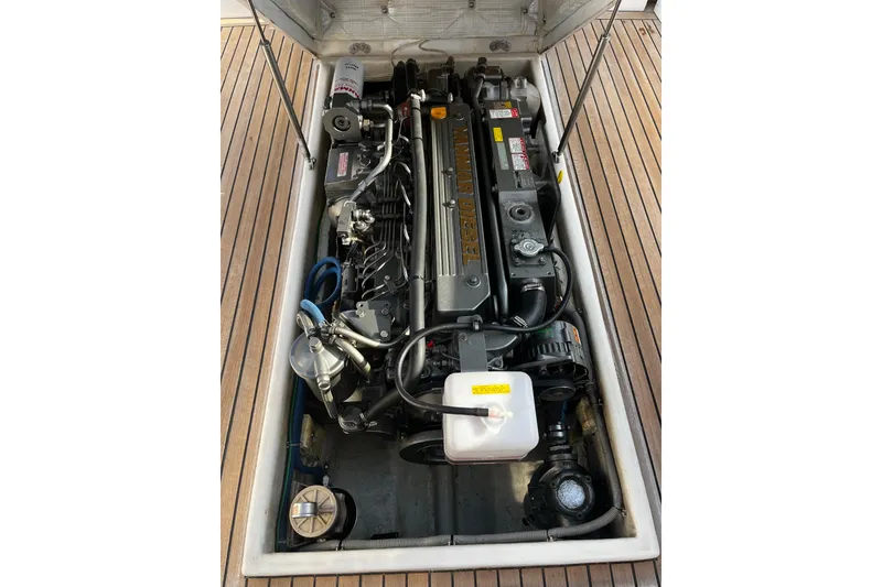 Slide: The Image of Engine compartment of 2001 Lyman-Morse Monhegan 30 boat, showcasing diesel engine. - 9