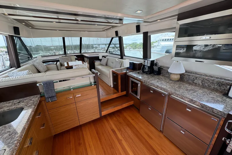 Slide: The Image of Luxurious interior of 2017 Tiara Yachts F53 Flybridge with elegant wood and granite finishes. - 28