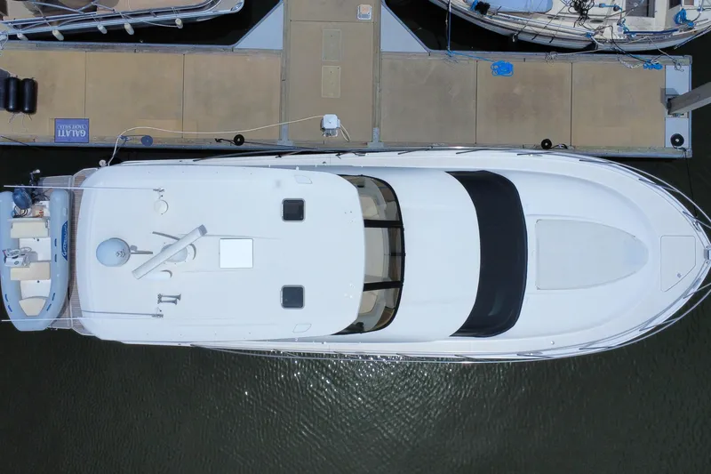 Slide: The Image of Overhead view of 2017 Tiara Yachts F53 Flybridge docked at marina. - 3
