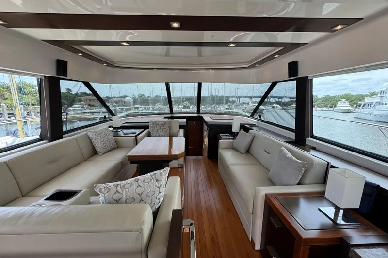 Slide: The Image of Luxurious interior of 2017 Tiara Yachts F53 Flybridge with elegant seating and panoramic windows. - 35