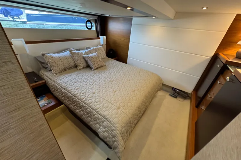 Slide: The Image of Luxurious bedroom interior of 2017 Tiara Yachts F53 Flybridge with elegant bedding. - 41