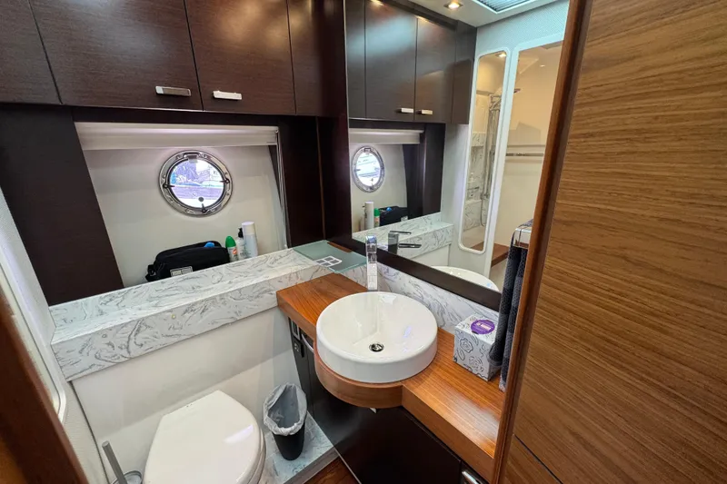 Slide: The Image of Luxurious bathroom interior of 2017 Tiara Yachts F53 Flybridge with modern fixtures. - 44