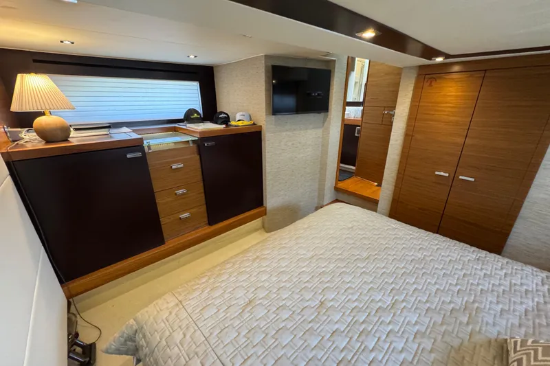 Slide: The Image of Luxurious bedroom interior of 2017 Tiara Yachts F53 Flybridge with modern wood cabinetry. - 46