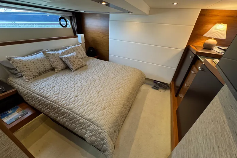 Slide: The Image of Luxurious bedroom interior of 2017 Tiara Yachts F53 Flybridge with elegant bedding and modern decor. - 50