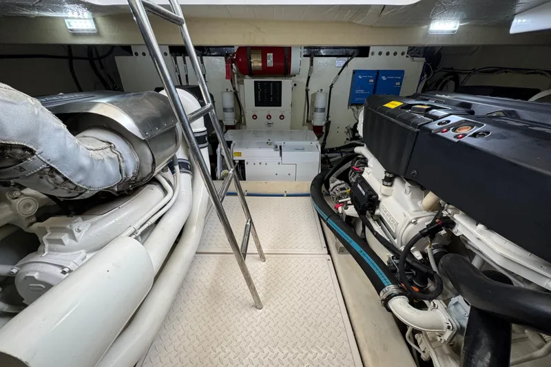 Slide: The Image of Engine room of 2017 Tiara Yachts F53 Flybridge with visible machinery and equipment. - 65
