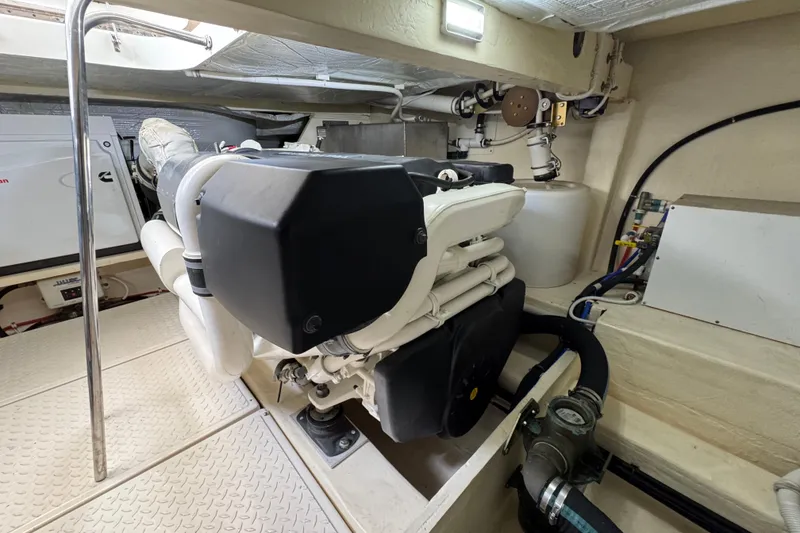 Slide: The Image of Engine room of 2017 Tiara Yachts F53 Flybridge, showcasing machinery and components. - 71