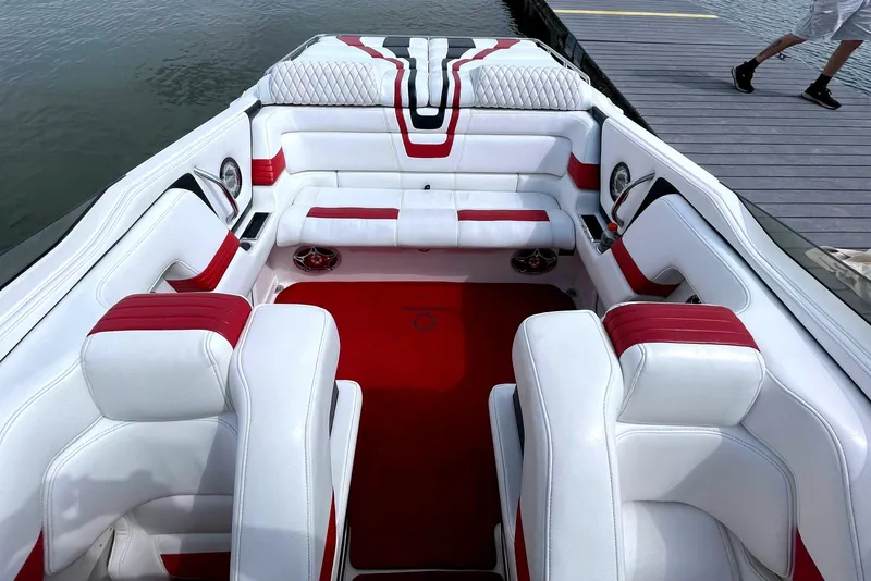 Slide: The Image of Interior of a 1995 Fountain 42 Lightning boat with white and red seating. - 10